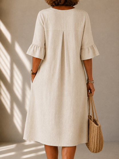 Delphine™ | Robe midi qui camoufle le ventre avec boutons